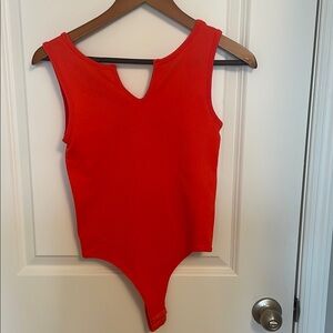 Vibrant Red Sleeveless Bodysuit with Keyhole V-Neck